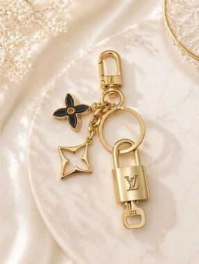 Authentic Louis Vuitton Gold Lock & Key with Unbranded Flower Clover Keychain